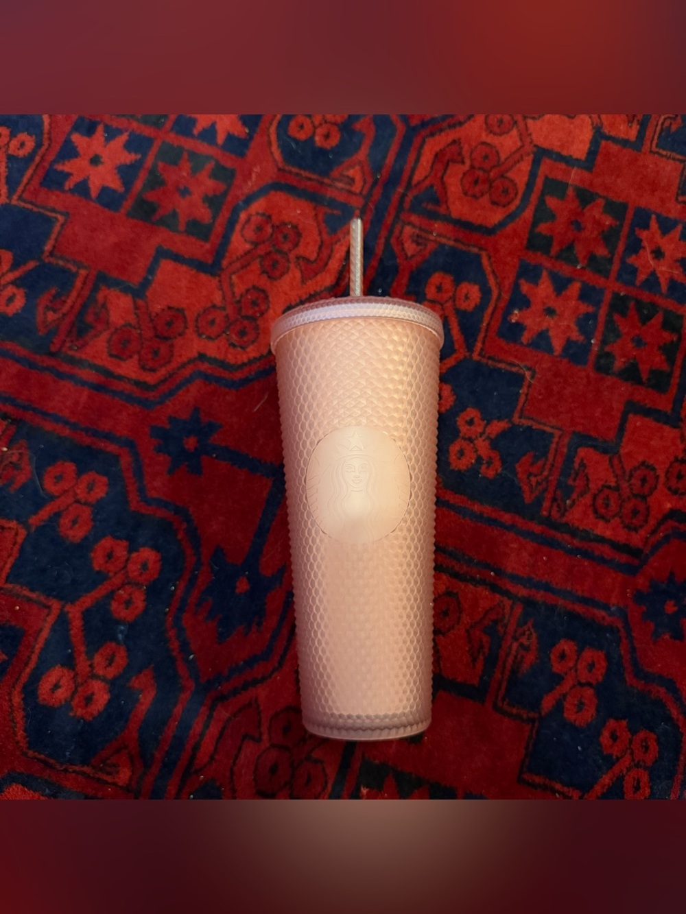Pink studded Starbucks cup